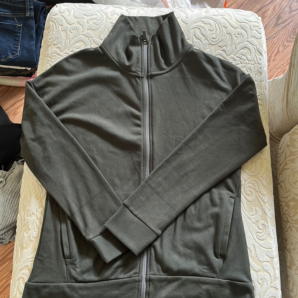 Olive green light weight jacket.